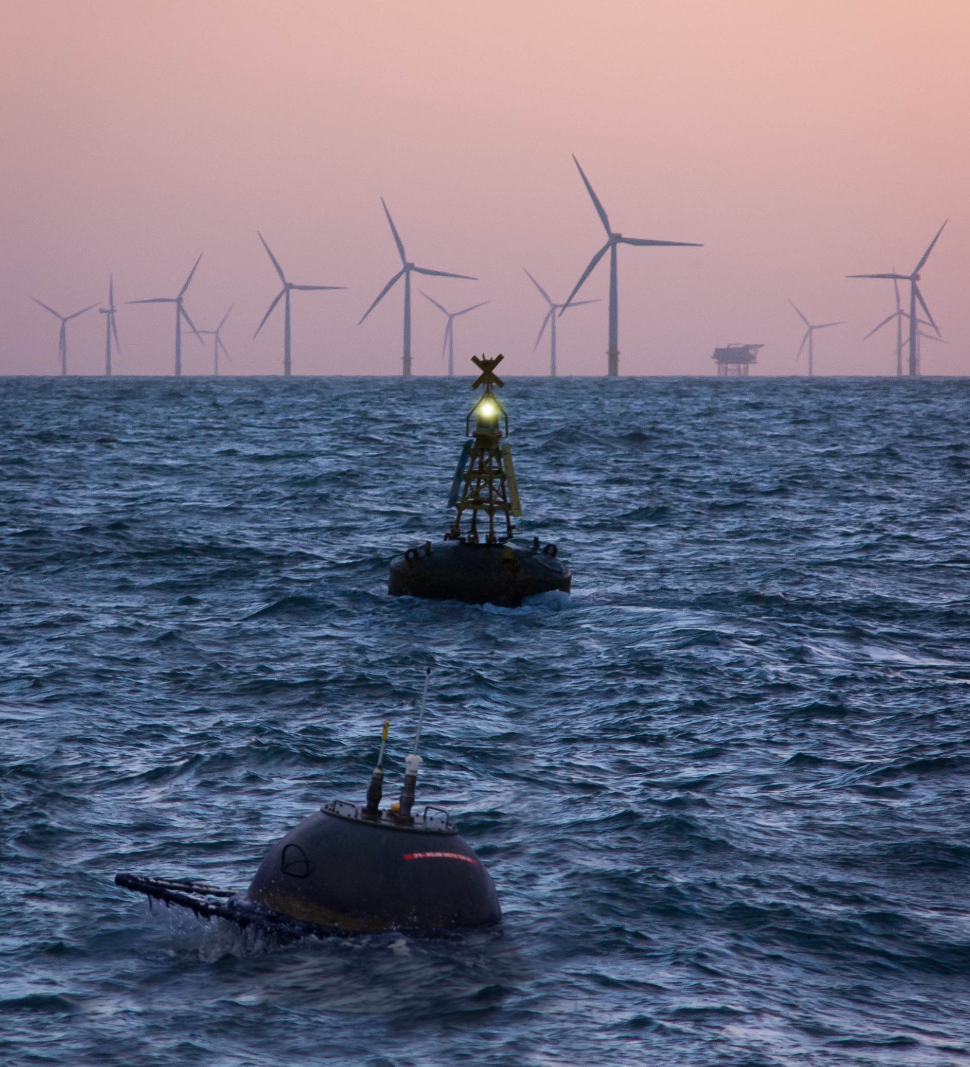 waverider in front of wind turbines